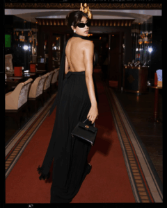 Janhvi Kapoor's elegant summer black ensemble from Cannes: a vintage Yves Saint Laurent halter dress from the 1975 Rive Gauche collection.